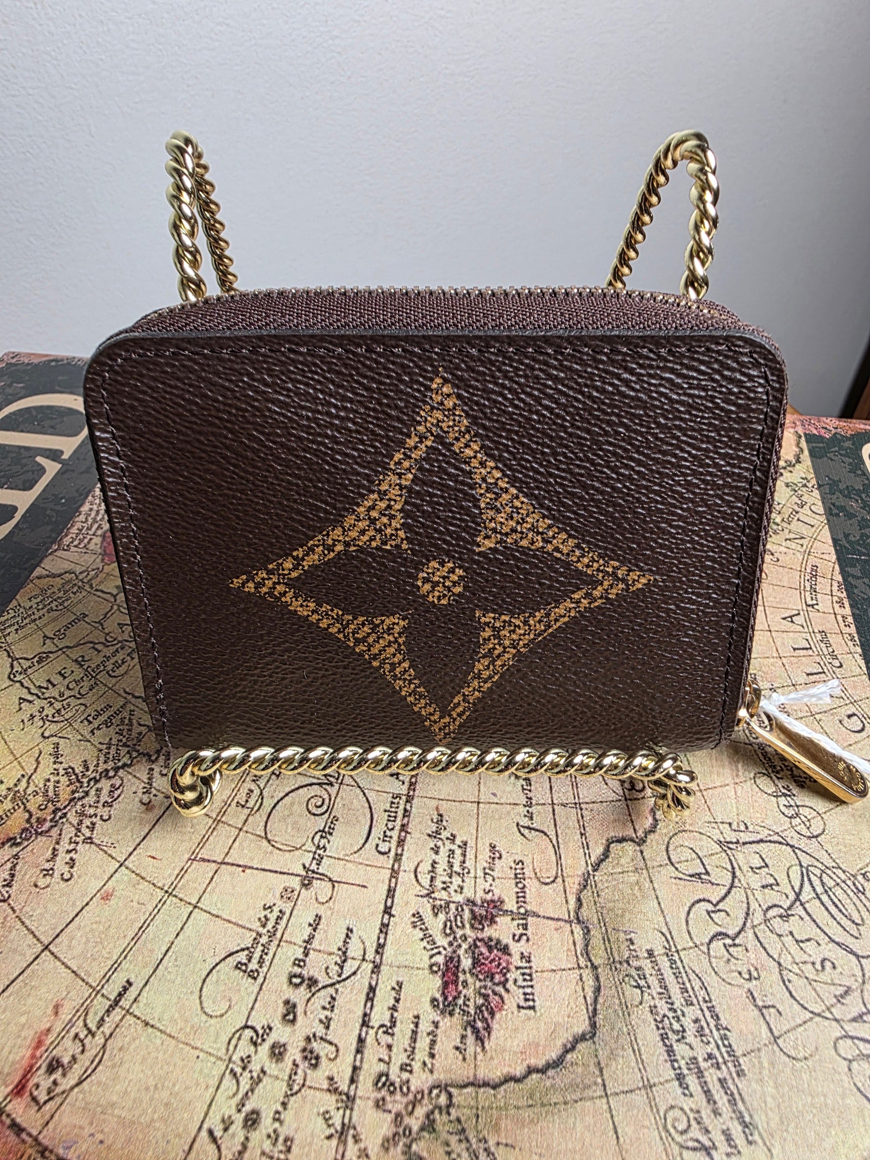 Louis Vuitton Reverse Monogram Zippy Compact Wallet