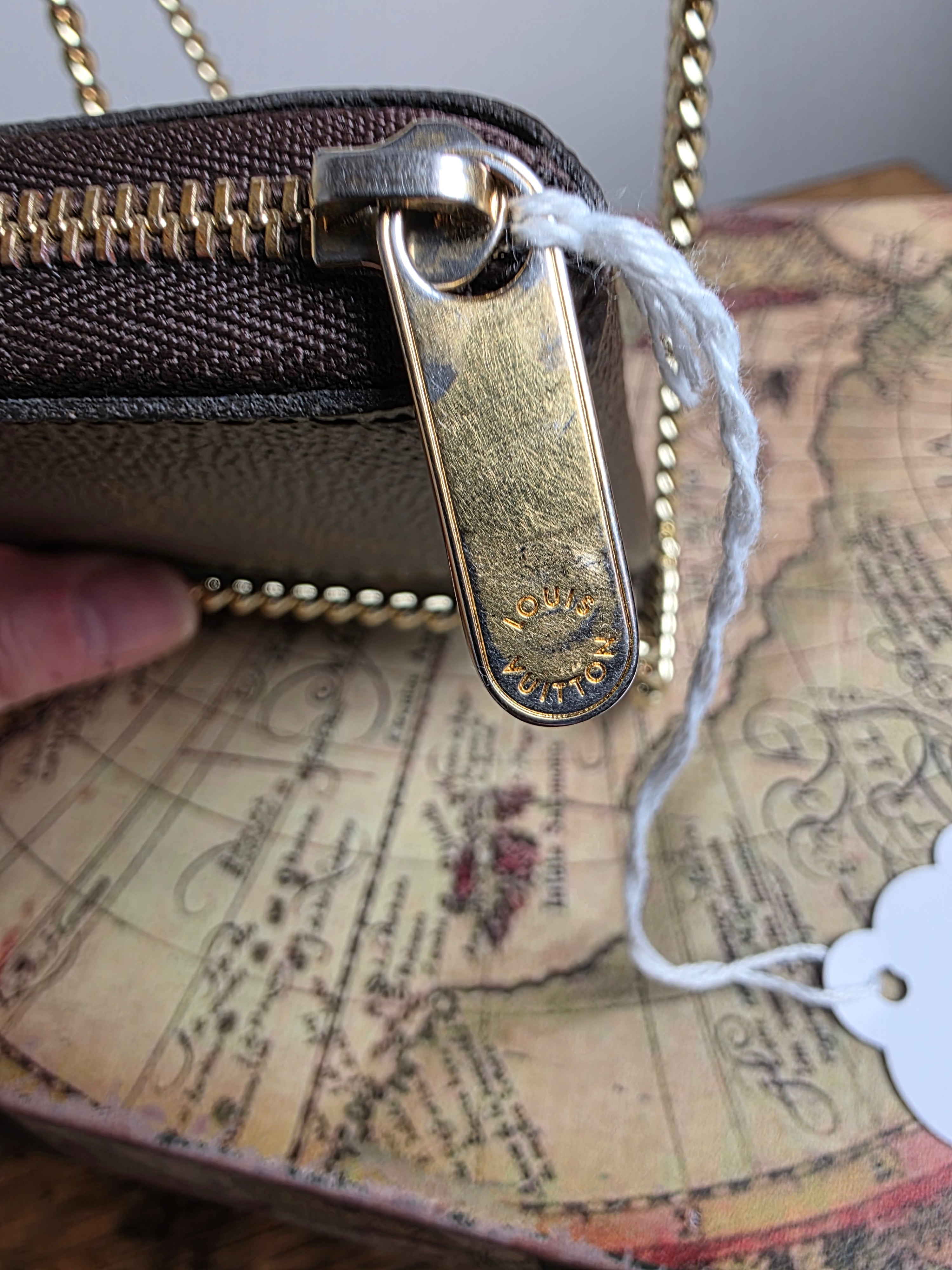 Louis Vuitton Reverse Monogram Zippy Compact Wallet