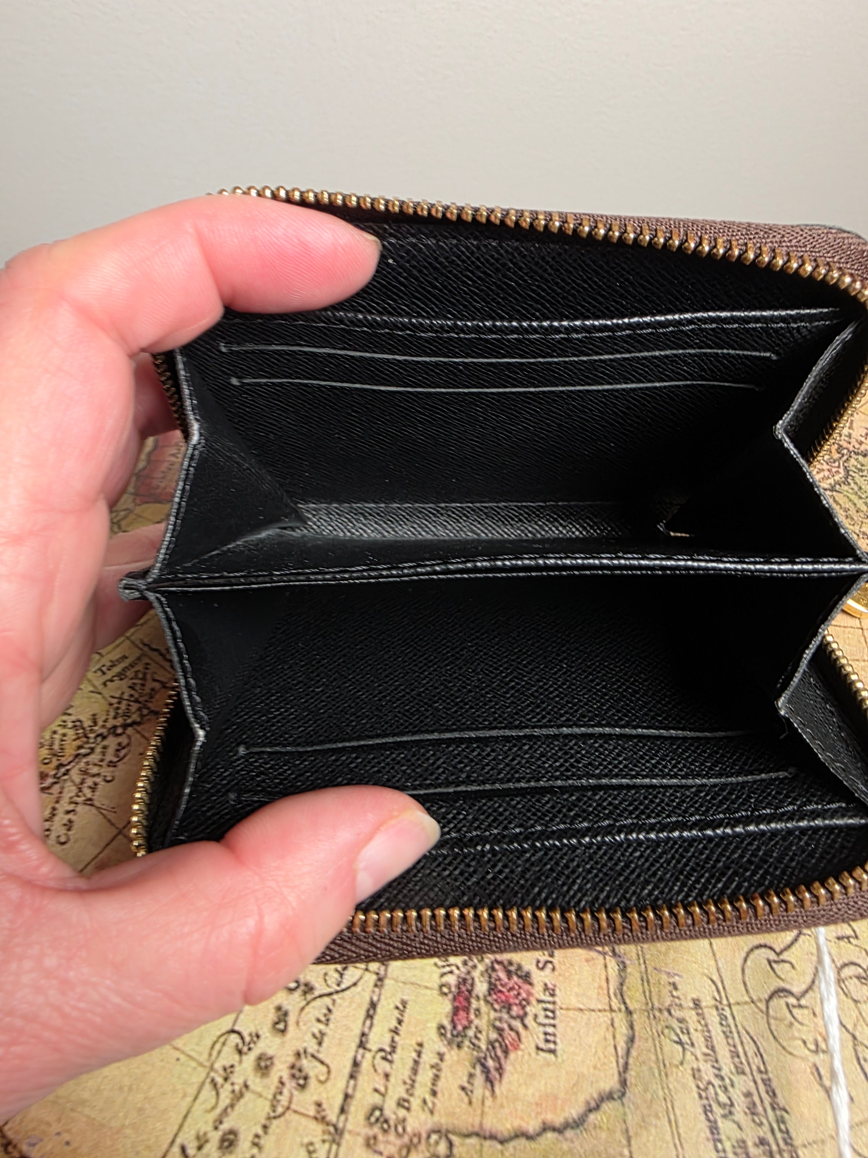 Louis Vuitton Reverse Monogram Zippy Compact Wallet