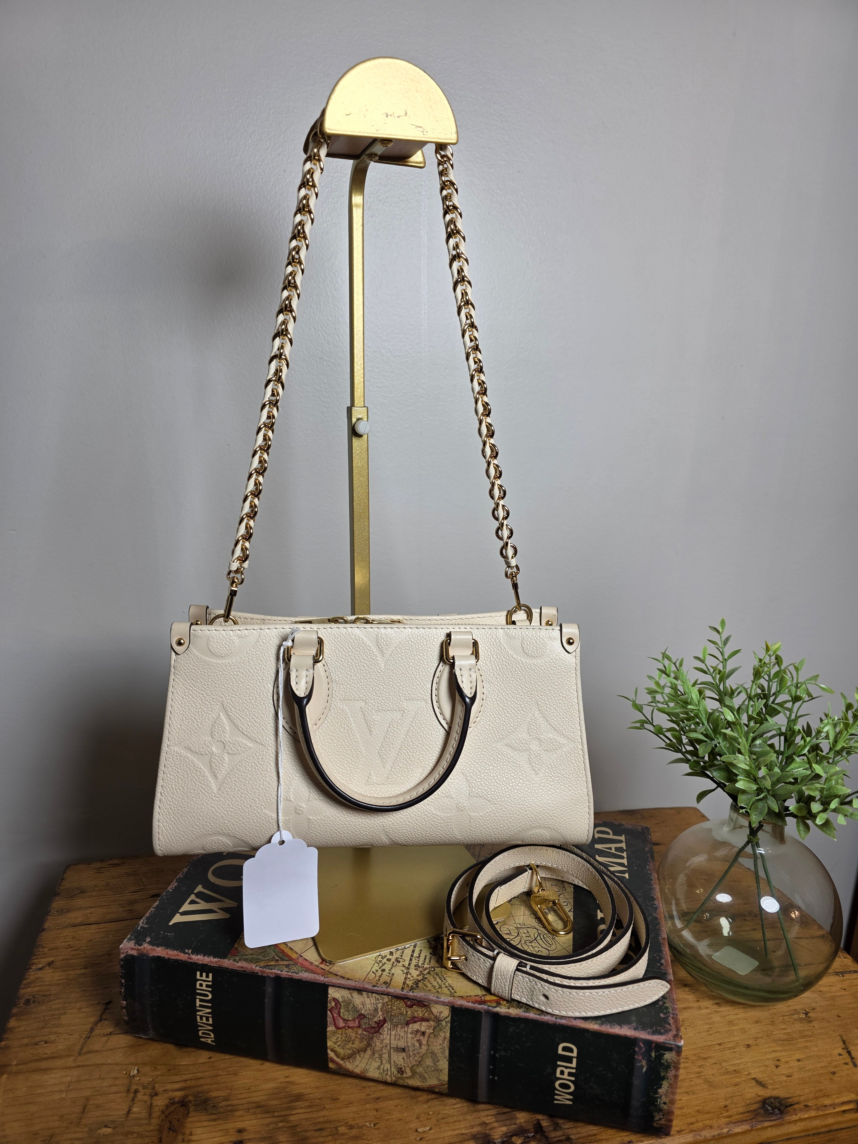 Louis Vuitton Creme Empreinte East West On The Go