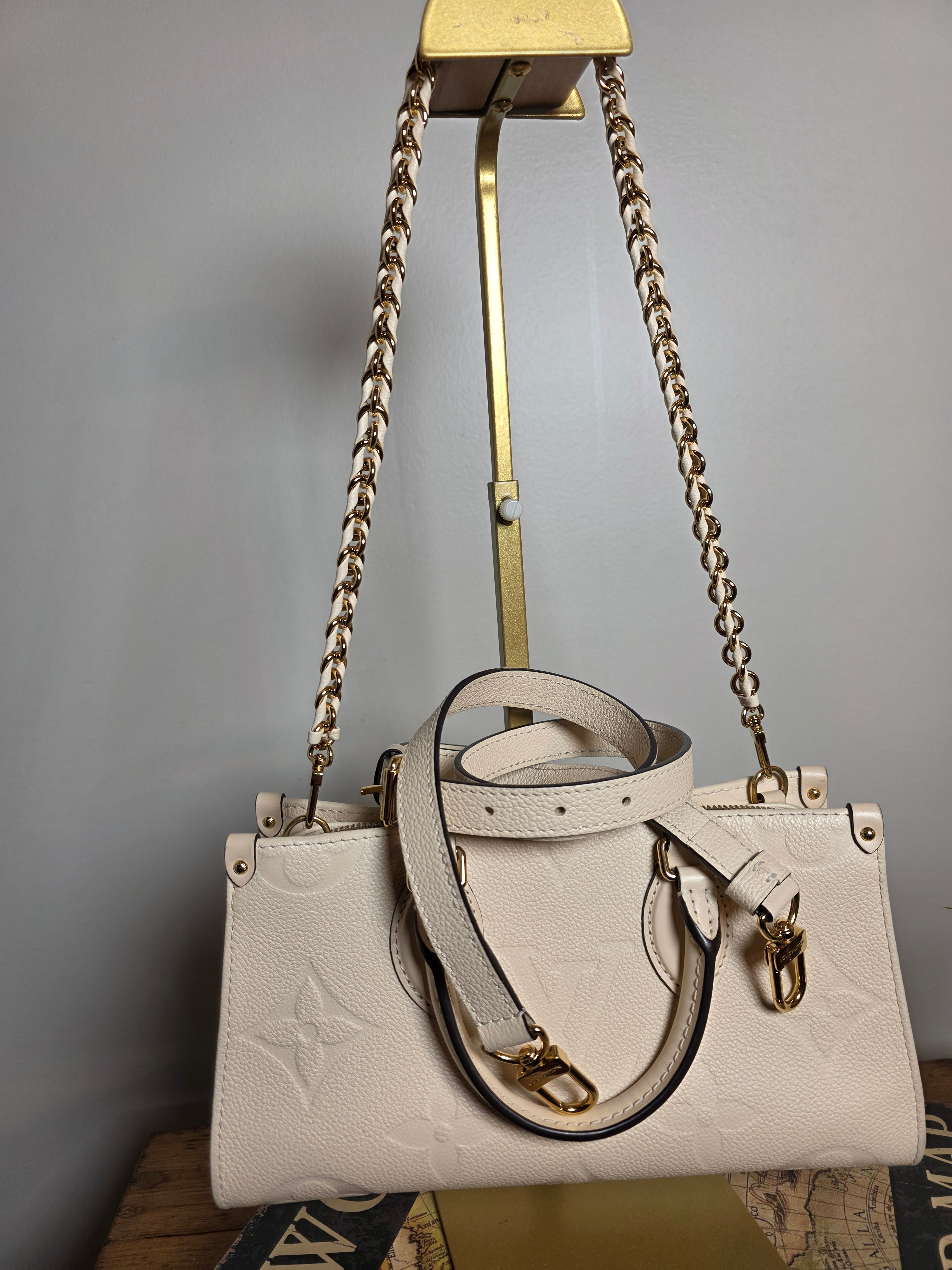 Louis Vuitton Creme Empreinte East West On The Go
