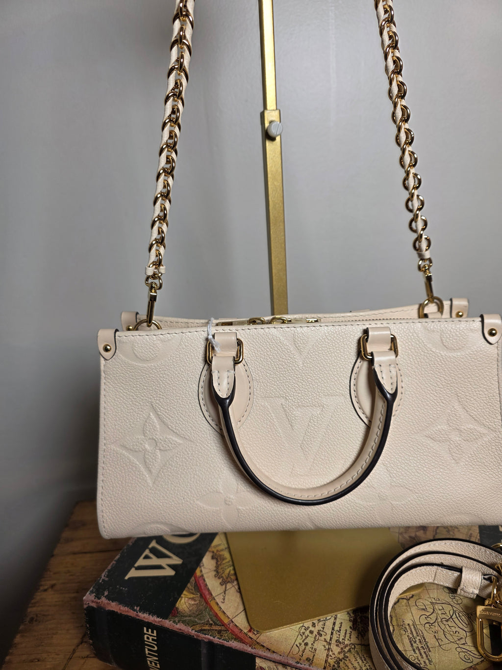 Louis Vuitton Creme Empreinte East West On The Go