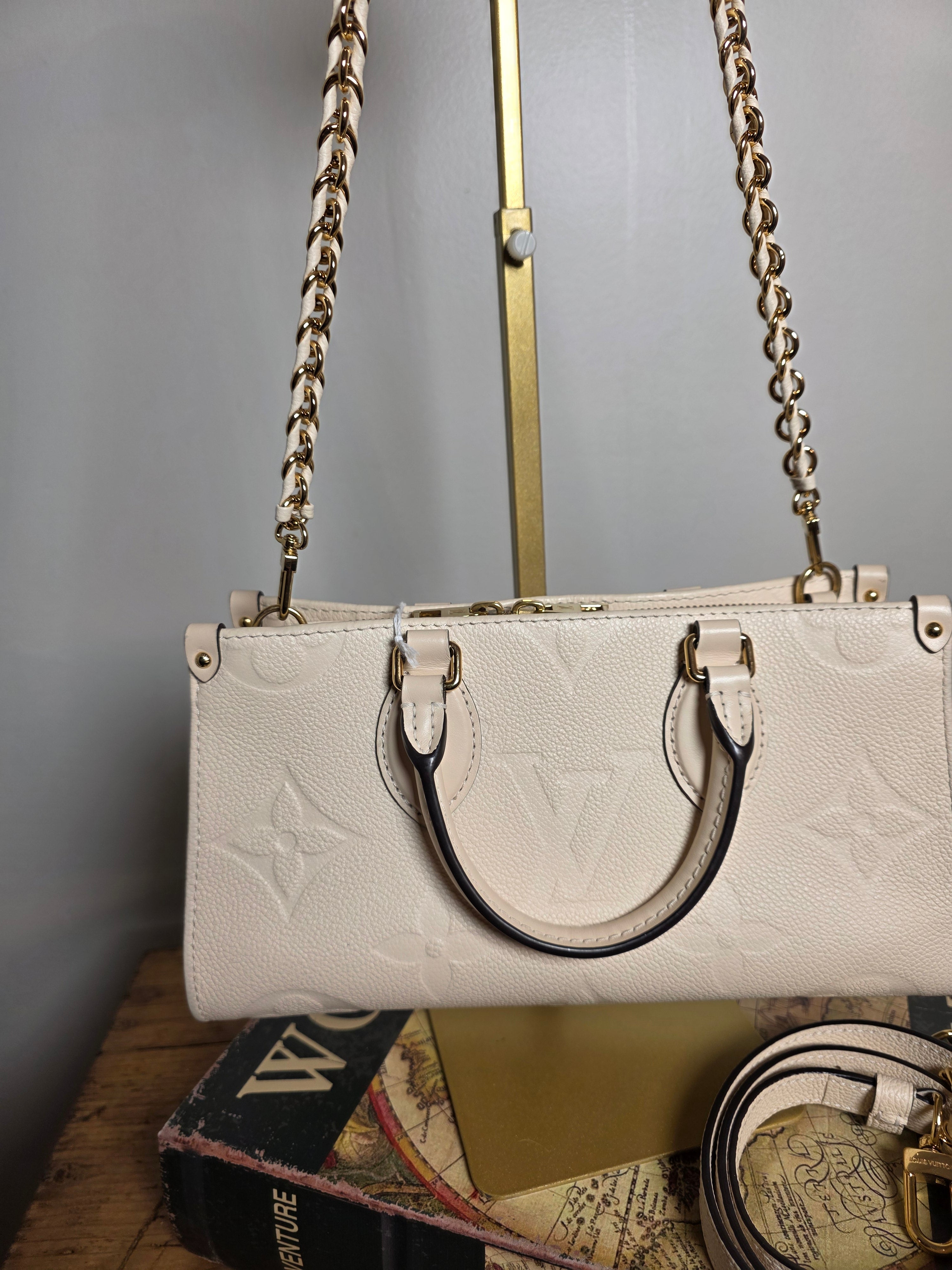 Louis Vuitton Creme Empreinte East West On The Go