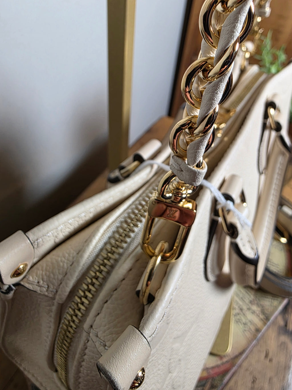 Louis Vuitton Creme Empreinte East West On The Go