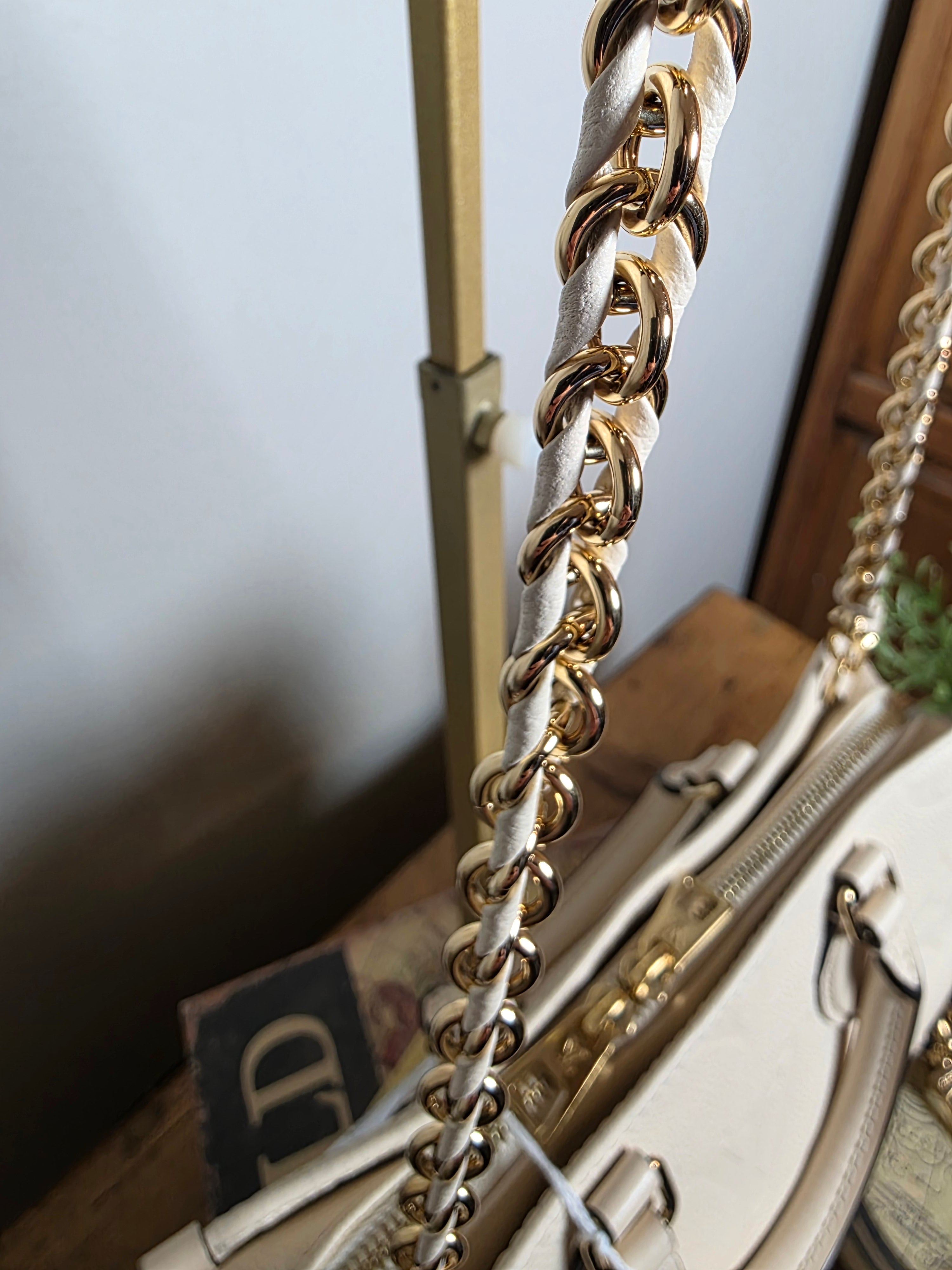 Louis Vuitton Creme Empreinte East West On The Go