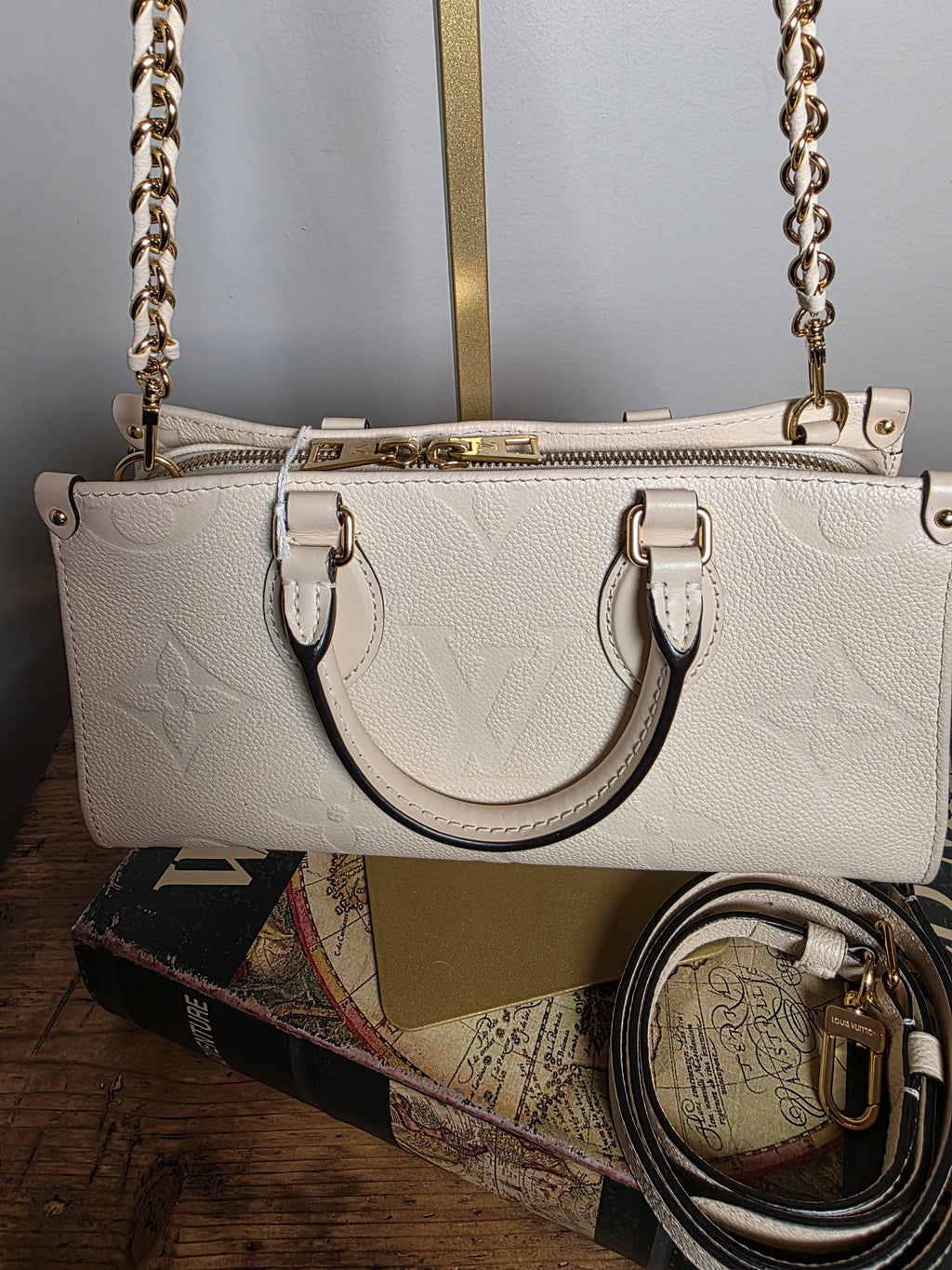 Louis Vuitton Creme Empreinte East West On The Go