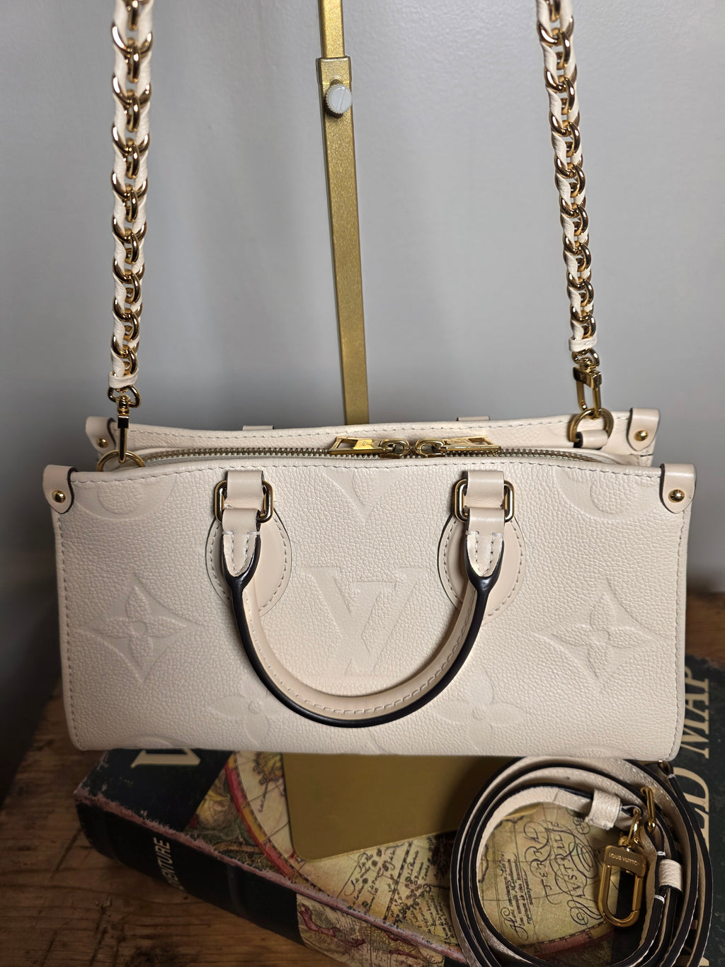 Louis Vuitton Creme Empreinte East West On The Go