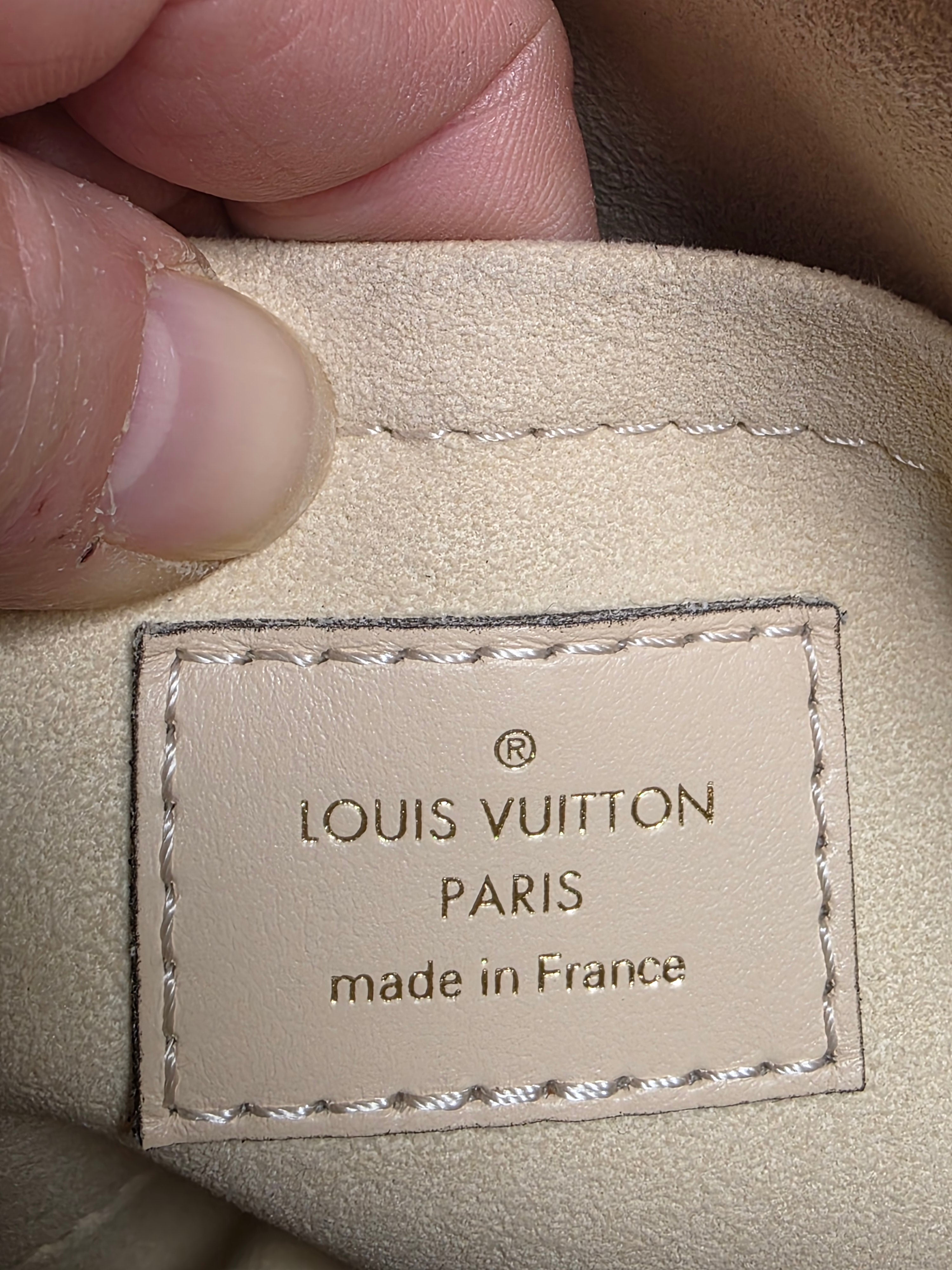Louis Vuitton Creme Empreinte East West On The Go